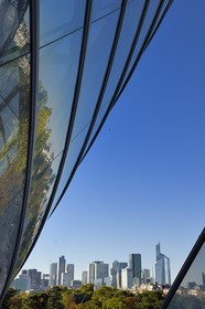 France, Paris, Louis Vuitton Foundation by architect Frank Gehry and La Defense in the background