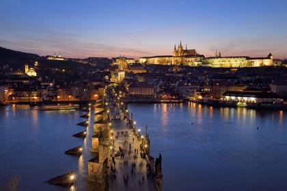 Czech Republic, Prague, historical centre listed as World Heritage by UNESCO, the Charles Bridge over Vltava River and St. Vitus cathedral overlooking the Royal Castle in the background
