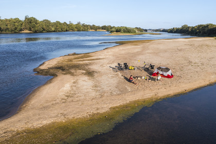 France, Maine-et-Loire, Loire valley listed as World Heritage by UNESCO, cycling along the banks of the Loire, camping for the night on one of the sandbanks forming islands on the Loire (aerial view)