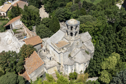 France, Bouches du Rhone, Arles, the Alyscamps, listed as World heritage by UNESCO, a pagan then Christian necropolis from the Roman era to the Middle Ages, comprising numerous sarcophagi, and the Saint-Honorat des Alyscamps church topped with its lantern of the dead (aerial view)
