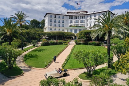 France, Alpes Maritimes, Saint Jean Cap Ferrat, Grand-Hotel du Cap Ferrat, a 5 star palace from Four Seasons Hotel, the doorman welcomes customers in a Morgan Roadster 4 4 (aerial view)
