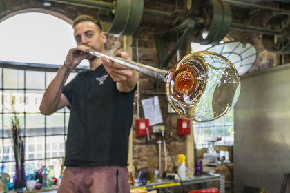 France, Moselle, Meisenthal, Centre international d'Art verrier (CIAV) (international glass centre), the glassmaker Geoffrey Richard in the blowing workshop