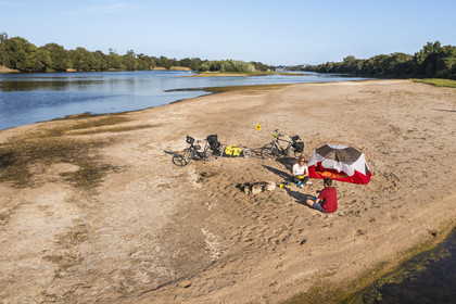 France, Maine-et-Loire, Loire valley listed as World Heritage by UNESCO, cycling along the banks of the Loire, camping for the night on one of the sandbanks forming islands on the Loire (aerial view)