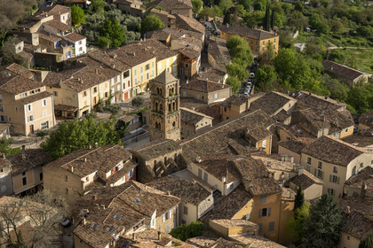 France, Alpes de Haute Provence, Parc Naturel Régional du Verdon, village of Moustiers Sainte Marie, labelled Les Plus Beaux Villages de France (The Most Beautiful Villages of France), the Notre-Dame-de-l'Assomption church with its 12th century bell tower