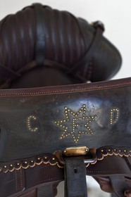 France, Bouches du Rhone, Les Saintes Maries de la Mer, the Mas Cacharel, saddle of camarguais gardian marked with the initials of the owner Florian Colomb de Daunant