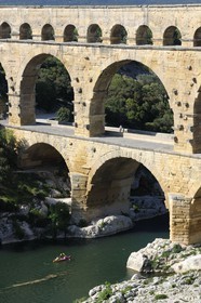 France, Gard, Pont du Gard listed as World Heritage by UNESCO, Roman aqueduct over Gardon River, canoeing