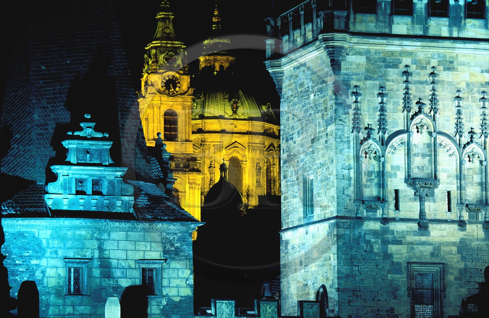 Czech Republic, Prague, Mala Strana Gate at the end of Charles Bridge over the Vltava and St Nicolas Church