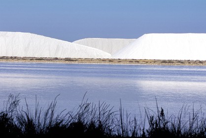 France, Gard, town of Aigues-Mortes, salt piles from the Les Salins du Midi salt marsh