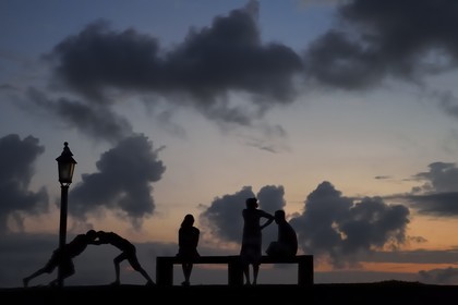 Sri Lanka, Southern Province, Galle Fort, listed as World heritage by UNESCO, family on the ramparts at sunset