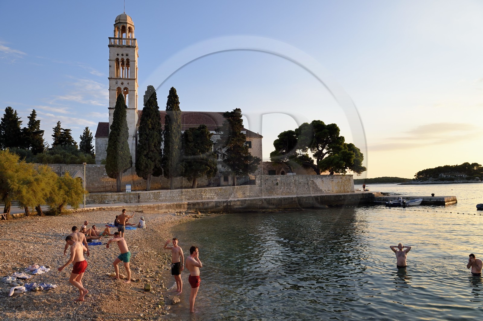 Croatia, Dalmatia, Dalmatian coast, Island of Hvar, the town of Hvar, beach at the foot of the 15th century Franciscan monastery