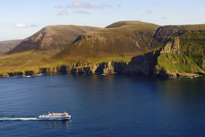 United Kingdom, Scotland, Orkney Islands, Island of Hoy, the ferry from Stromness in front of Ward Hill is the highest hill in Orkney (aerial view)