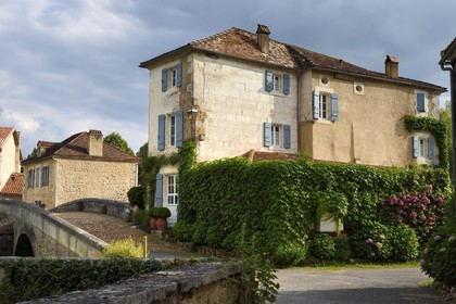 France, Dordogne, Périgord Vert, Saint Jean de Cole, labelled Les Plus Beaux Villages de France (The Most beautiful Villages of France), the former pharmacy next to the bridge