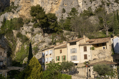 France, Alpes de Haute Provence, Parc Naturel Régional du Verdon, village of Moustiers Sainte Marie, labelled Les Plus Beaux Villages de France (The Most Beautiful Villages of France), the village at the foot of the cliffs