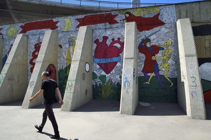 Georgia, Tbilisi, passage under fast tracks with walls covered with graffiti