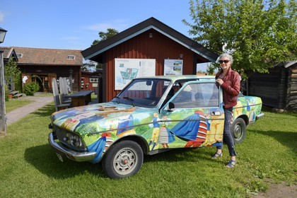 Sweden, Dalarna County, Leksand area, Tällberg, car painted in the colors of folk costumes