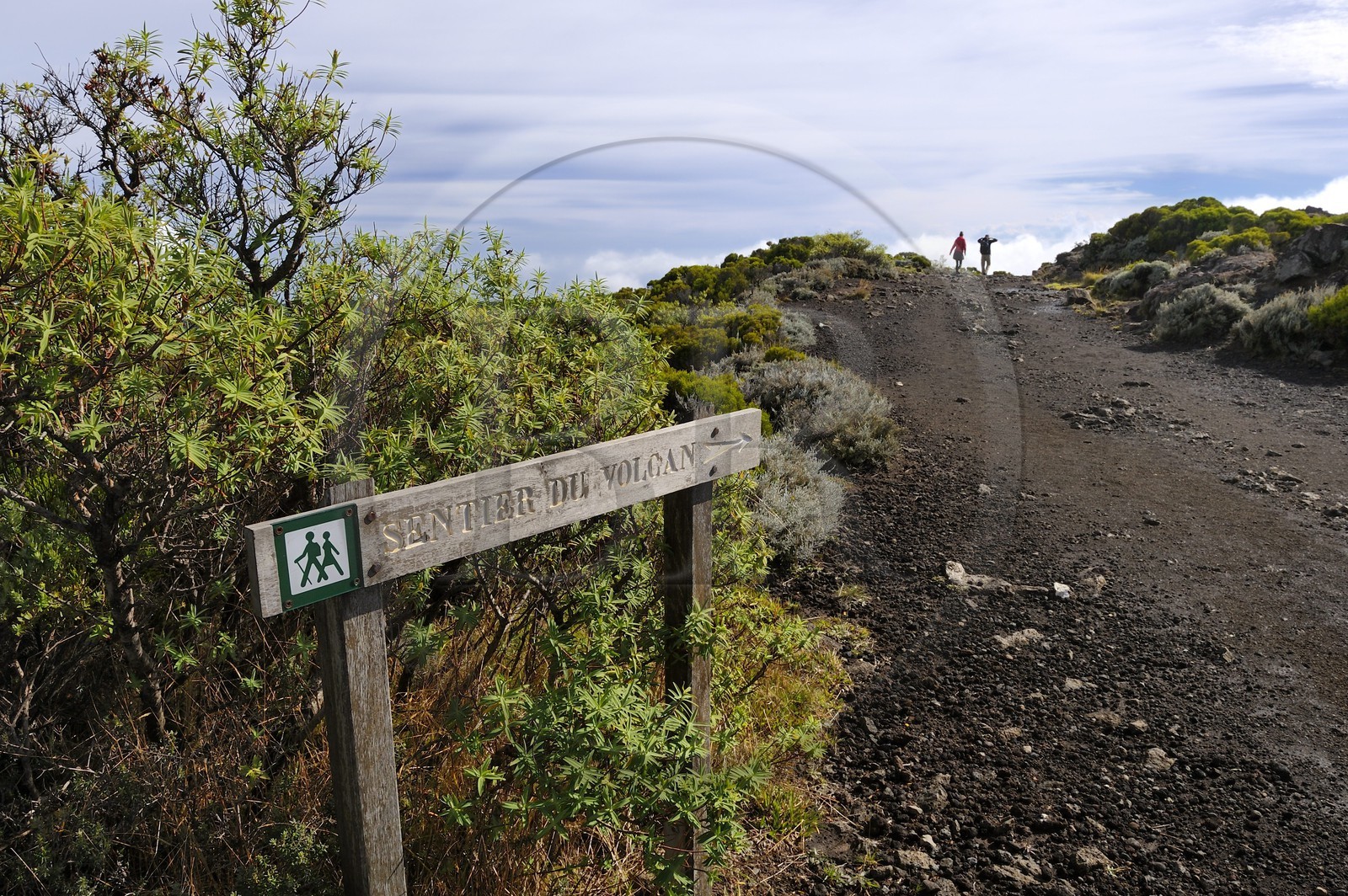 France, Reunion island (French overseas department), Piton de la Fournaise volcano, listed as World Heritage by UNESCO, hikers on the trail at the top of the Enclos