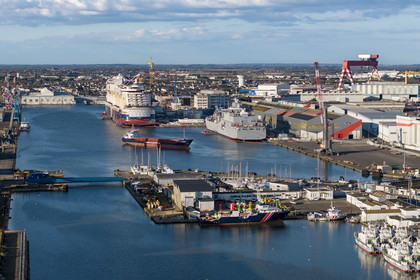 France, Loire-Atlantique, Saint-Nazaire, the Penhoët floating dock and cruise shipyard (aerial view)