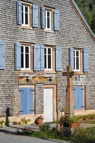 France, Vosges, Le Valtin, village in the upper valley of the Meurthe, facade of house covered with shingles or wooden slats used for protection against bad weather
