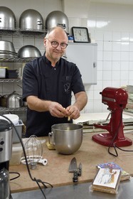 France, Meurthe-et-Moselle, Nancy, the pastry chef Didier Hulot making the gingerbread for Saint Nicholas Day, the dough is made from flour and honey that have been macerated for several months