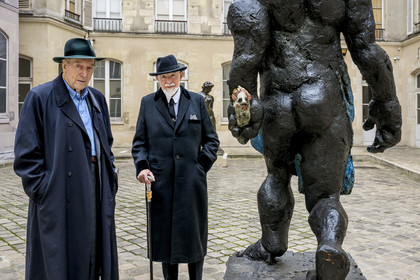 France, Paris, Musée Maillol art museum, German painter and sculptor Markus Lüpertz during his exhibition in dialogue with the work of Aristide Maillol, his gallerist Michael Werner on his left, sculpture (detail) Der Morgen oder Hölderlin, 2011, Painted bronze