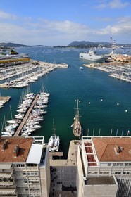 France, Var, Toulon, La Frontale and quai Kronstadtthat gives on the civil port, the Mistral (L9013) amphibious helicopter carrier of the French Navy in the background