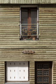 France, Loire Atlantique, Paimboeuf, facade of house with fish decoration in the main street