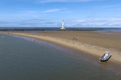 France, Gironde, Verdon sur Mer, rocky plateau of Cordouan, lighthouse of Cordouan, listed as World Heritage by UNESCO, visit to the lighthouse with transfer by boat and amphibious barge (aerial view)