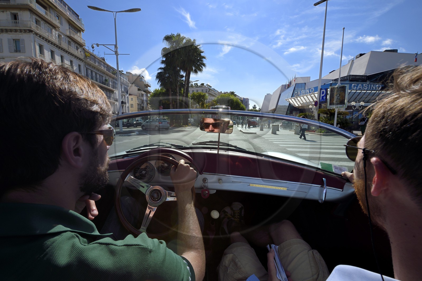 France, Alpes-Maritimes, Cannes, Palais des Festivals on the boulevard de la Croisette aboard a collection convertible Porsche Speedster 356