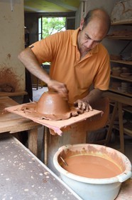 France, Alpes de Haute Provence, Parc Naturel Régional du Verdon, village of Moustiers Sainte Marie, labelled Les Plus Beaux Villages de France (The Most Beautiful Villages of France), city of ceramics, the the potter Pierre Liautaud at the ceramics Serrailler