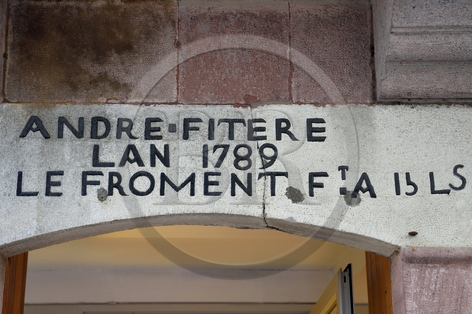 France, Pyrenees Atlantiques, Basque Country, Saint Jean Pied de Port, 9 rue d'Espagne (Spain street) on the Way of St. James, lintel that reflects the anger of the baker André Fitere who complained in 1789 of the too high price of wheat at 15 pounds