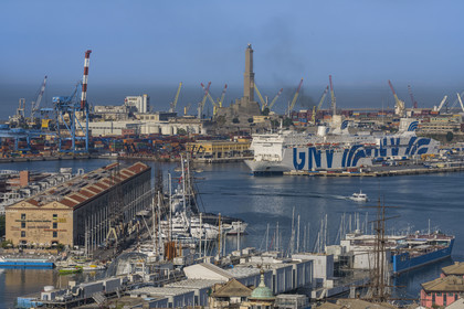 Italy, Liguria, Genoa, the Porto Antico (Old Port) seen from from the Belvedere of Castelletto, the commercial port in the background dominated by the Lanterna lighthouse