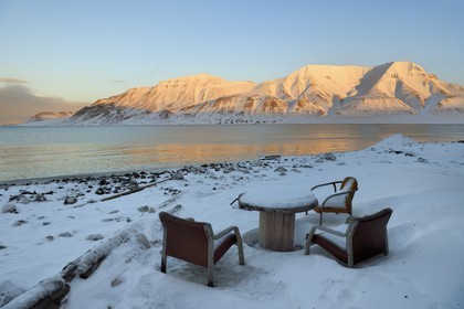 Norway, Svalbard, Spitzbergen, Longyearbyen, table with a view on the edge of the Adventfjorden