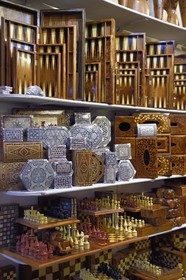 Morocco, High Atlas, Marrakech, Imperial city, Medina listed as World Heritage by UNESCO, backgammon, chess and wooden box in a souk shop