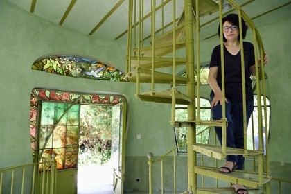 France, Meurthe-et-Moselle, Nancy, Ecole de Nancy Museum in the former estate of Eugene Corbin, stained glass windows door of the aquarium pavilion (1904) by Jacques Gruber, the curator Valerie Thomas