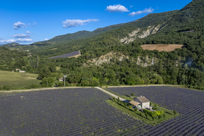 France, Drome, regional natural park of Baronnies provencales, Vercoiran, house in the center of a lavender field (aerial view)