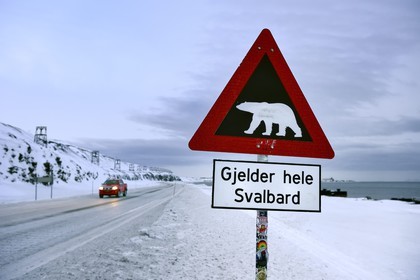 Norway, Svalbard, Spitzbergen, Longyearbyen, warning sign of potential danger of presence of polar bear, Gjelder hele Svalbard applies to all of Svalbard
