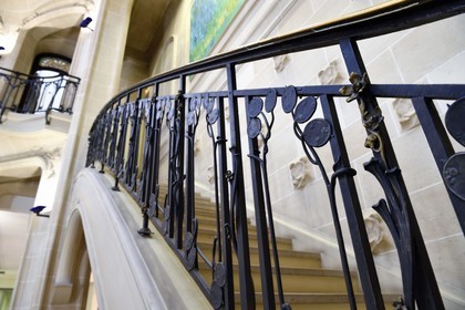 France, Meurthe-et-Moselle, Nancy, rue Saint-Jean, former Renauld bank and current BNP Paribas of Art Nouveau style, staircase ironwork with the motive of the flower Lunaria annua by Louis Majorelle