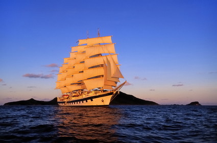 Caribbean sea, Union Island, five masted ship SPV Royal Clipper with every sail set in front of Union Island