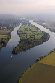 France, Eure, the Seine downstream of Vernon around Notre-Dame de l'Isle, a small boat sailing in front of the island Emient (aerial view)
