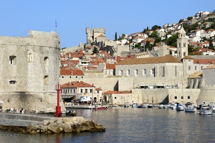 Croatia, Dalmatia, Dalmatian coast, Dubrovnik, Historic Centre listed as World Heritage by UNESCO, the ramparts on the sea side, the Saint Jean Tower building at the entrance to the Port left and the Minceta Tower in the background