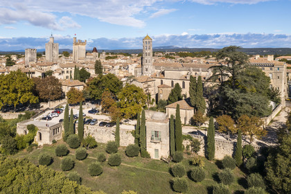 France, Gard, Uzès, the King's tower, the Eveché tower, the Ducal castle called Le Duché with the Bermonde tower and the Saint-Théodorit cathedral with the Fenestrelle tower on the right (aerial view)