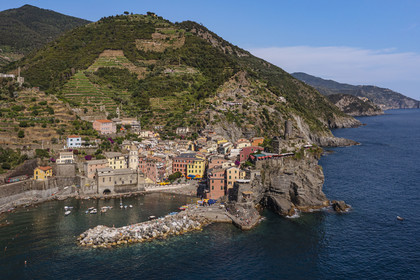 Italy, Liguria, Cinque Terre National Park listed as World Heritage by UNESCO, village of Vernazza and its port (aerial view)