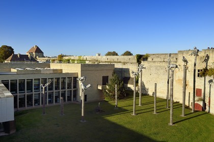 France, Calvados, Caen, the ducal castle of William the Conqueror, the Museum of Fine Arts, sculptures by Huang Yong Ping, One Man, Nine Animals (1999) monumental set of ten sculptures perched on masts 4 to 12 meters high each