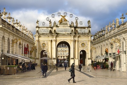 France, Meurthe-et-Moselle, Nancy, place Stanislas (former Place Royale) during the feast of Saint-Nicolas, listed as World Heritage by UNESCO, the Arc de Triomphe (Porte Héré)