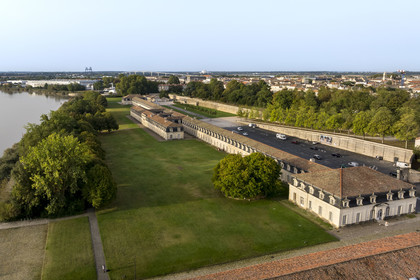 France, Charente Maritime, Rochefort, International Sea Center in the former maritime Arsenal of Rochefort, the Corderie Royale designed by Colbert in 1666 on the banks of the Charente river (aerial view)