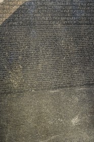 United Kingdom, London, Bloomsbury area, the British Museum, Ancient Egypt, the Rosetta Stone, engraved stela fragment of ancient Egypt bearing three versions (hieroglyphs, Egyptian demotic and Greek alphabet) of the same text that allowed the deciphering of hieroglyphs in the 19th century by Jean-François Champollion