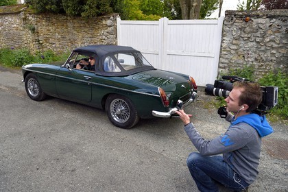 France, Yvelines, Montchauvet, shooting for the television of the Preferred Village of the French (Village Préféré des Français) with Stéphane Bern, Stéphane Bern driving a MG convertible