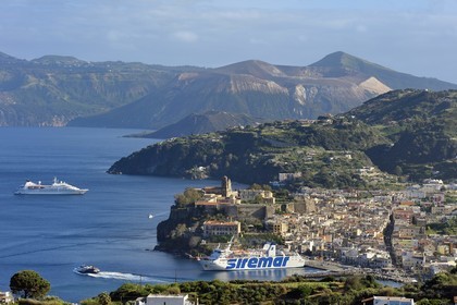 Italy, Sicily, Aeolian Islands, listed as World Heritage by UNESCO, Lipari Island, the town of Lipari and Vulcano Island volcano in the background