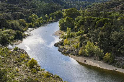 France, Gard, Pont du Gard classified World Heritage by UNESCO, Grand Site de France, the Gardon river at the foot of the Roman aqueduct bridge