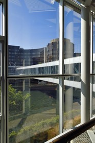 France, Bas Rhin, Strasbourg, European district, the European Parliament, Winston Churchill building connected to the Louise-Weiss building by a footbridge over the Ill river